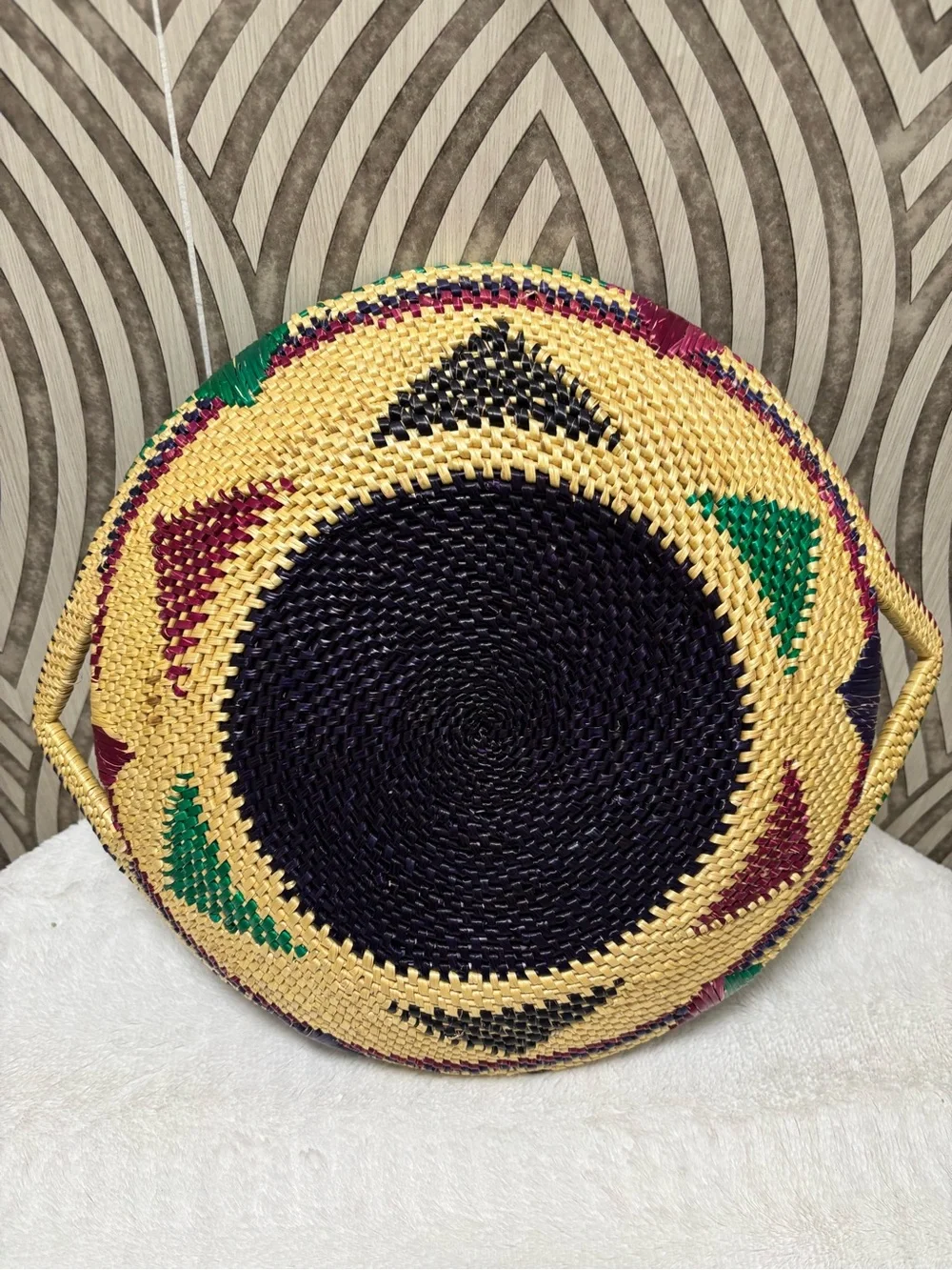 African hand woven colorful wall basket with handles